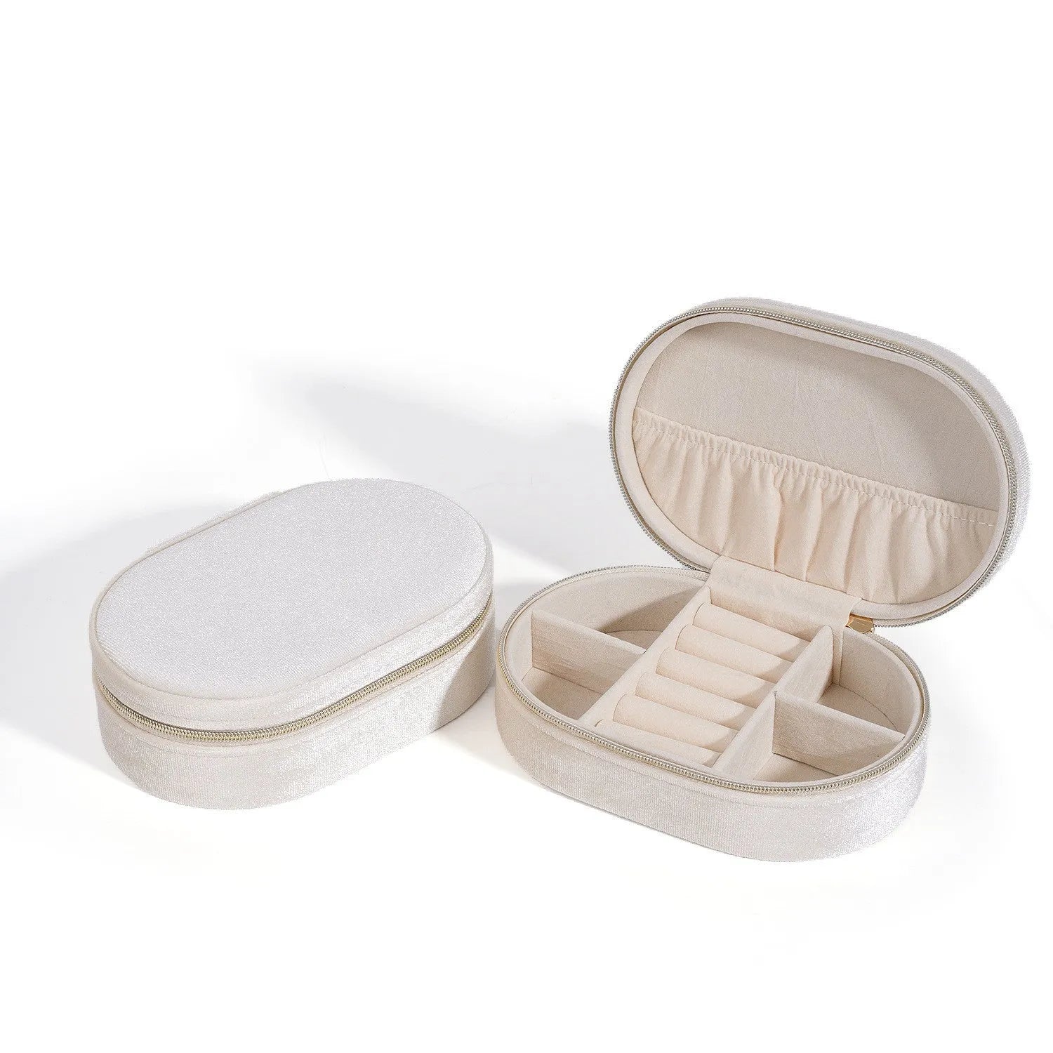 Oval velvet jewellery storage box in lake blue with flannel interior, measuring 15 by 10 cm.
