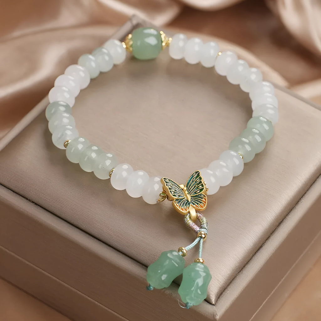 Green jade bracelet with abacus beads and electroplated butterfly tassel decoration