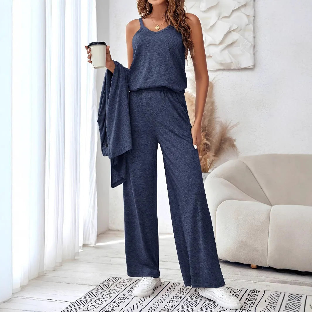 Blue women's three-piece casual suit set with sling top, cardigan, trousers, and suspenders.