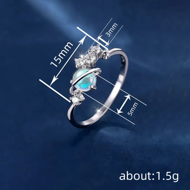 Geometric copper ring with electroplated white gold finish, available in sizes No 6 to No 10, shown on a model's hand.