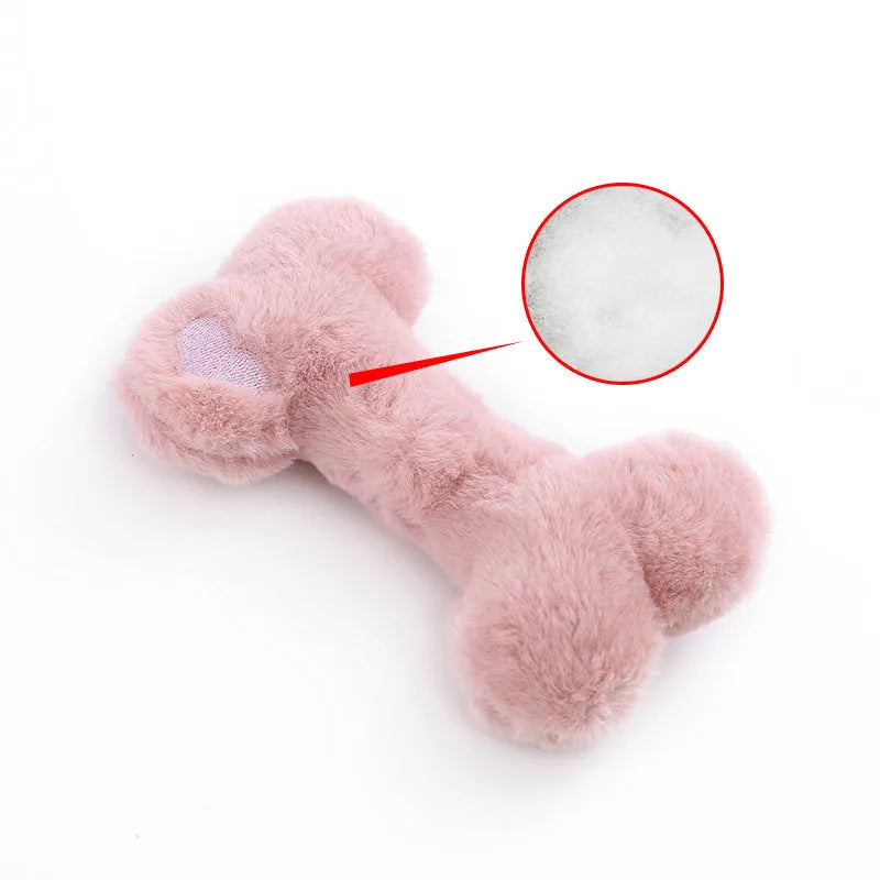 Blue love bone shaped plush dog toy with squeaker on a white background