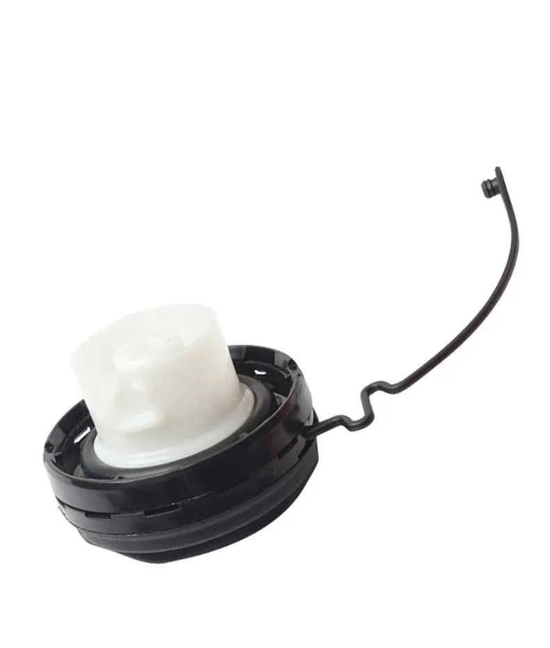Black snap-on fuel tank cap for Toyota vehicle replacement.