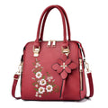 Large embroidered flower handbag for women in horizontal square shape with zipper closure and single strap