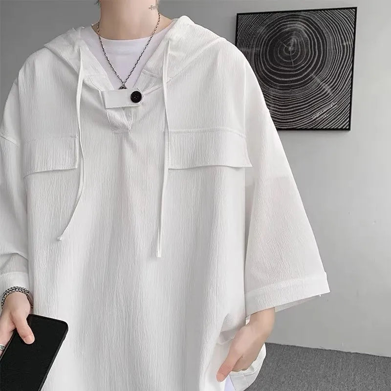 Men's hooded short sleeve t-shirt in loose fit available in multiple colours including black, white, and blue