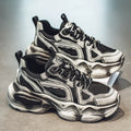 Men's black and grey mesh platform sneakers with a round toe and lace-up front on a rubber sole.