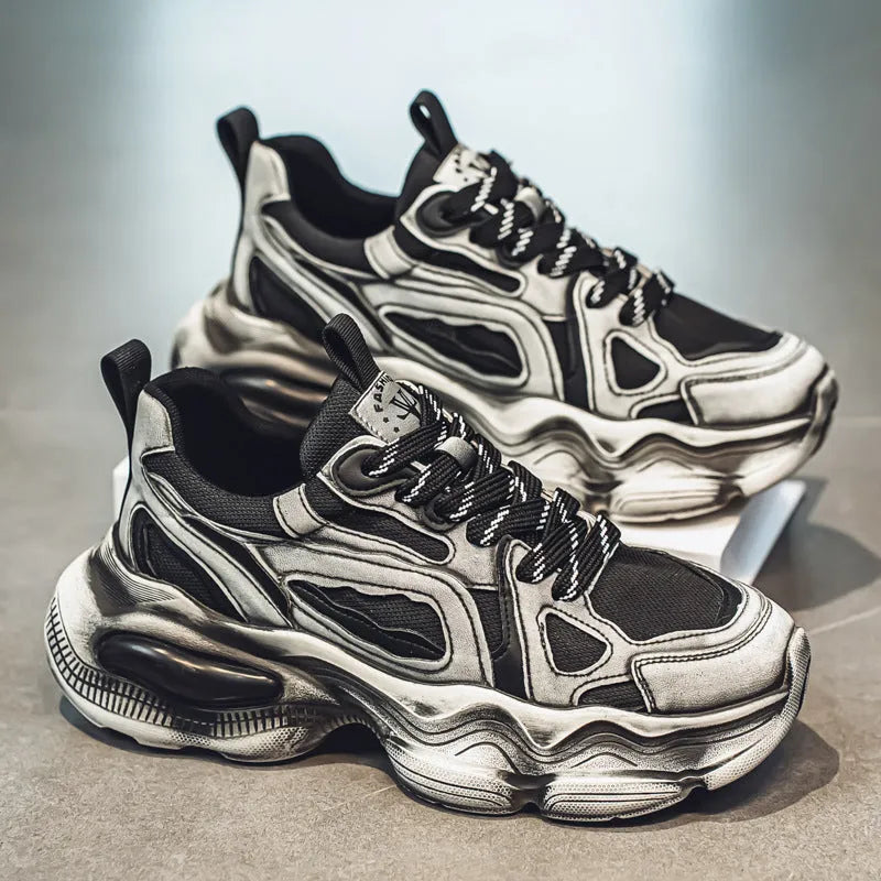 Men's black and grey mesh platform sneakers with a round toe and lace-up front on a rubber sole.