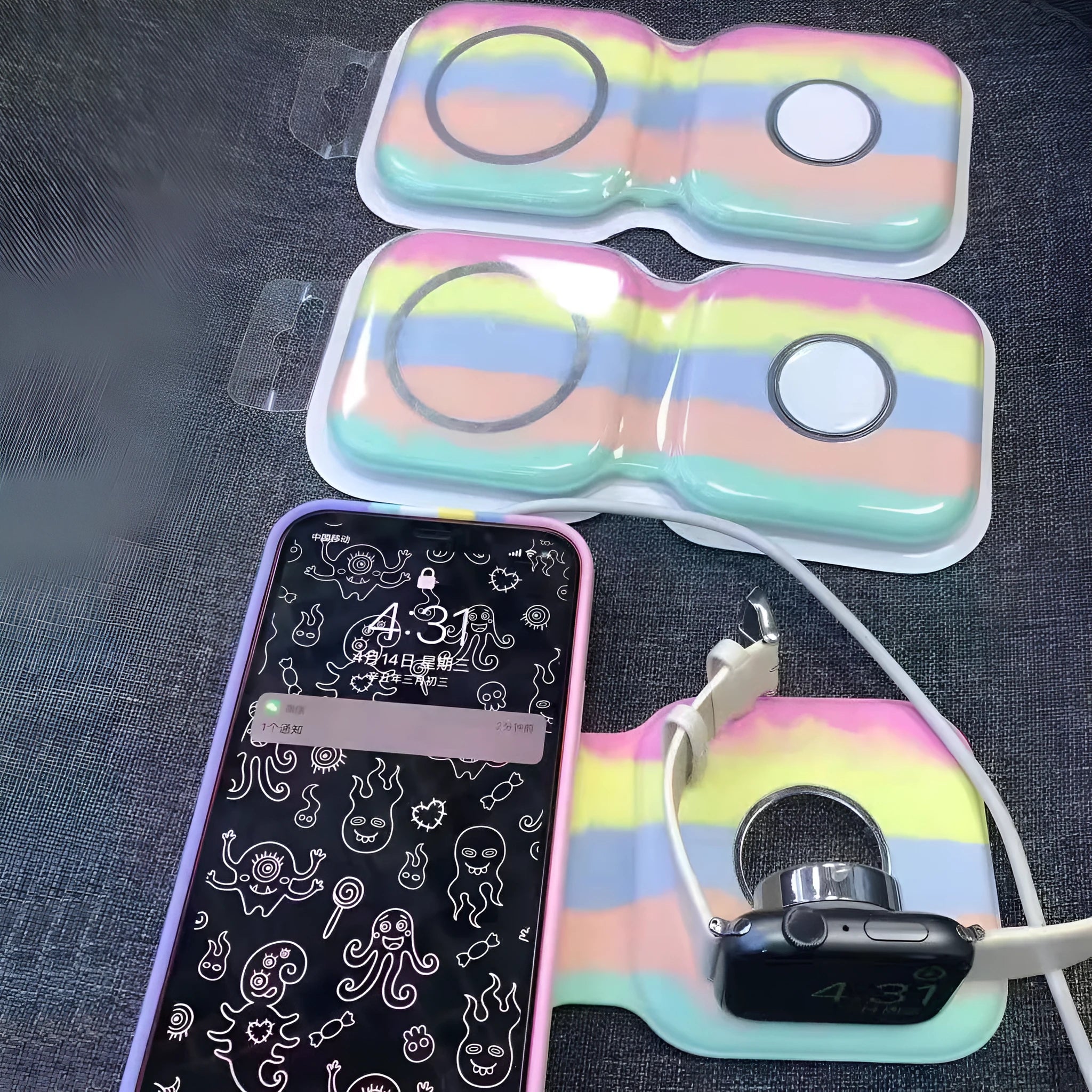LFX-163 foldable wireless charger in fish-water blue colour charging a mobile phone and watch