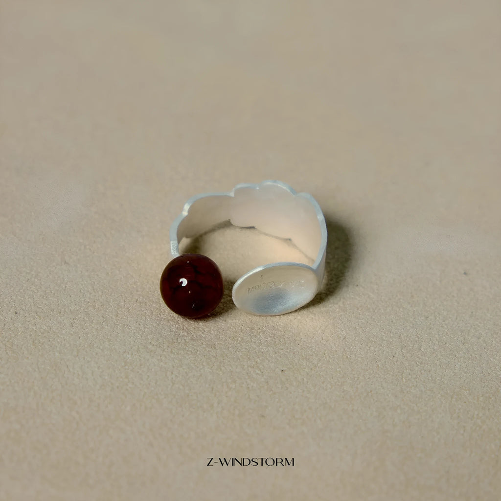 Small electroplated alloy jewellery piece with a diamond shape, shown as a bracelet or ring option.