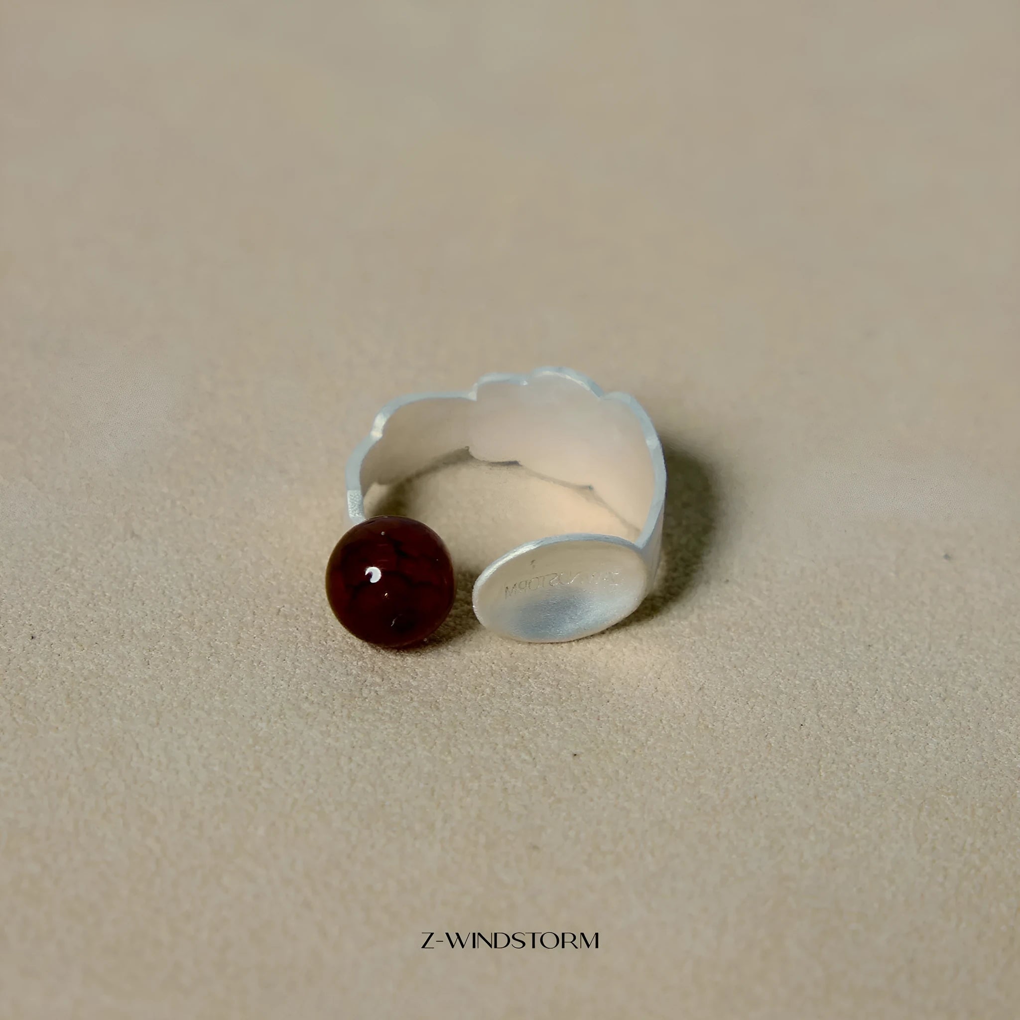 Small electroplated alloy jewellery piece with a diamond shape, shown as a bracelet or ring option.