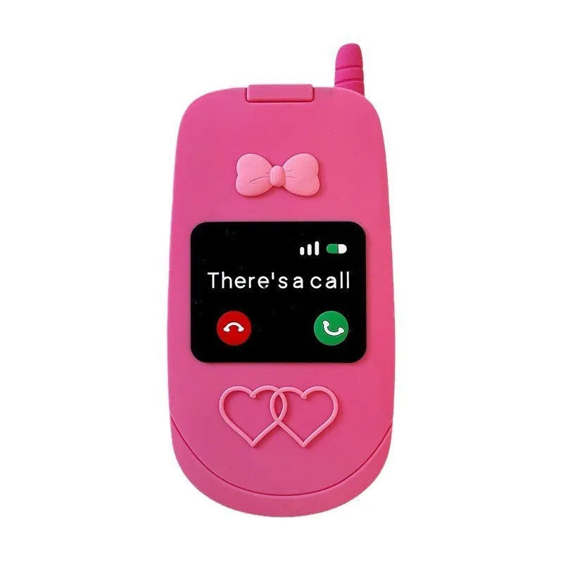 Pink silicone iPhone case shaped like a flip phone with a built-in mirror on the front.