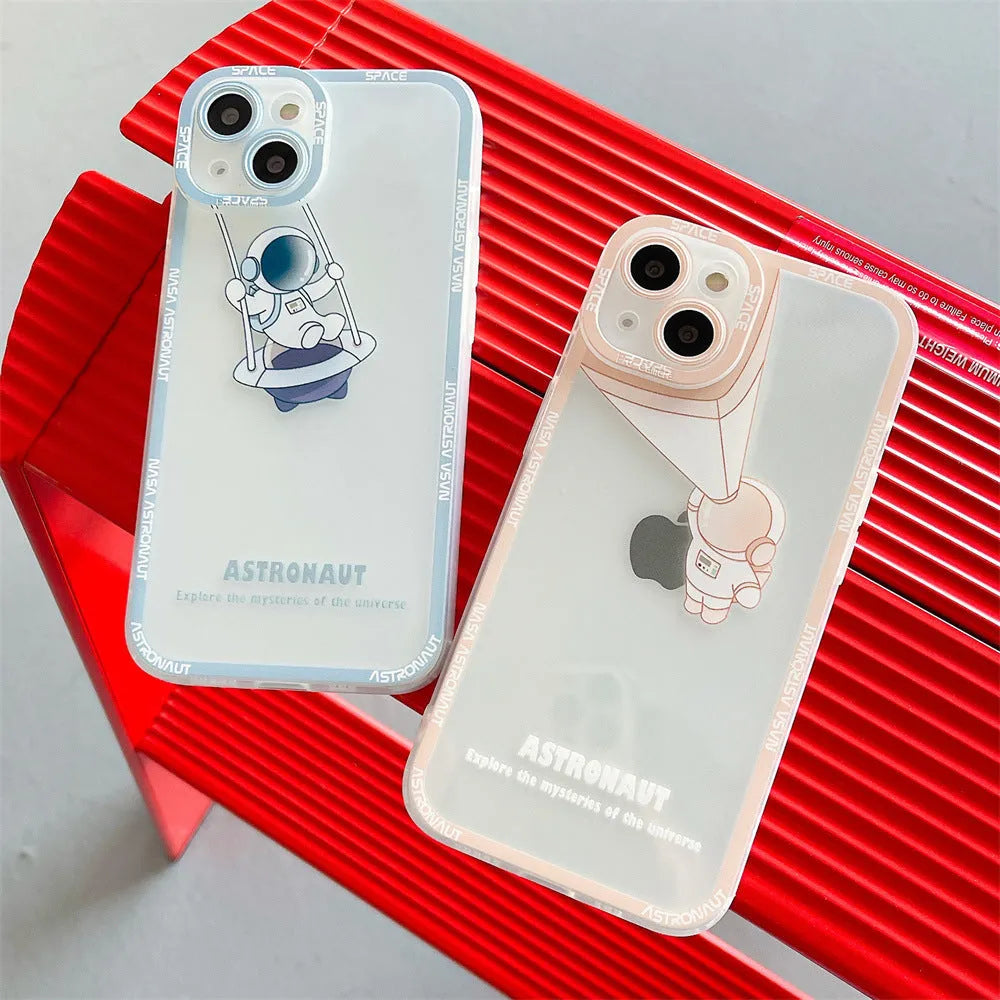 Transparent silicone phone case with blue astronaut print showing through clear background on iPhone