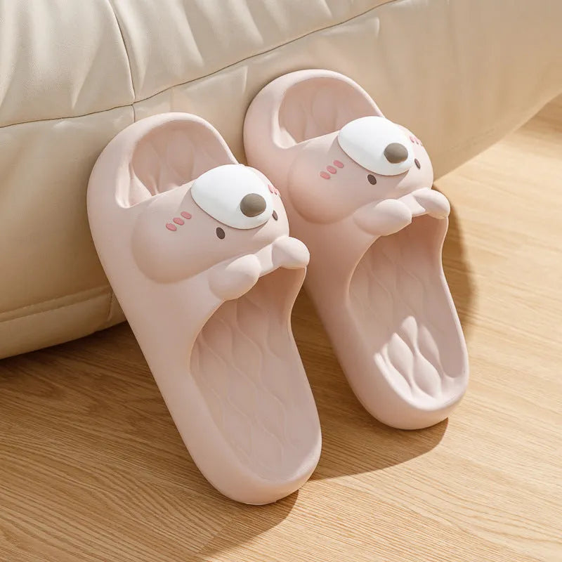 Pair of brown cartoon bear EVA flip flops for adults, toe baring sandal style