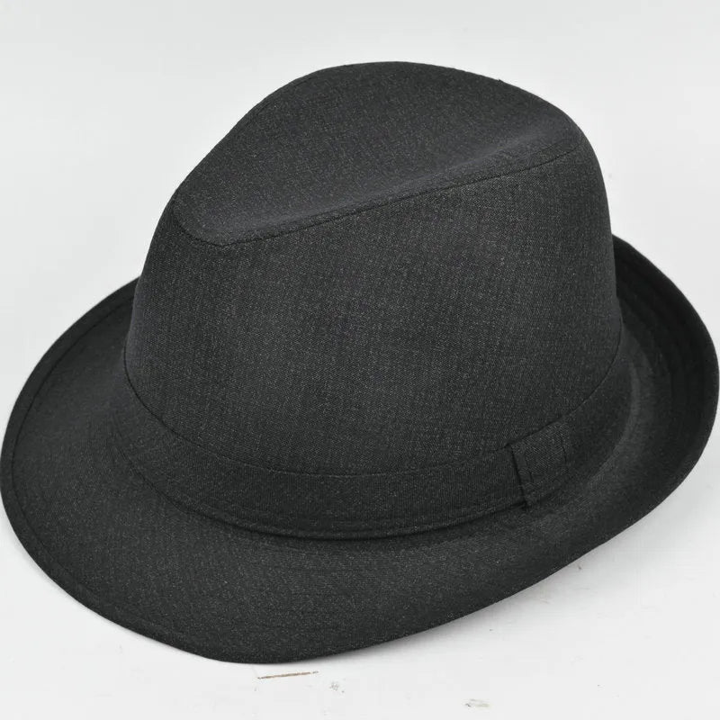 Classic brown fedora hat for men on a stand, showing structured crown and brim.