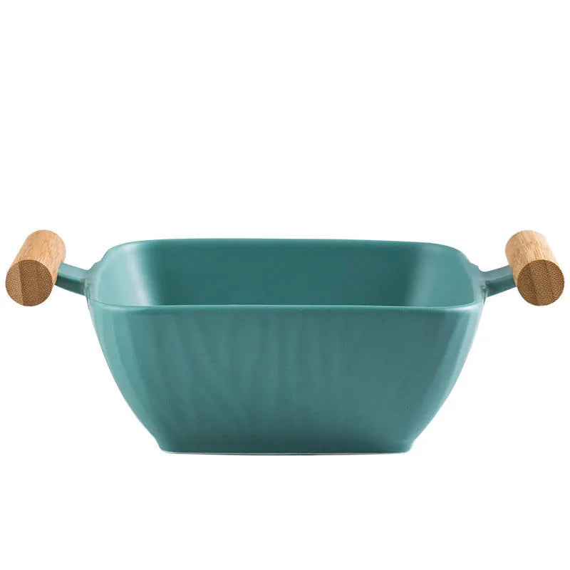 Modern irregular-shaped porcelain bowl with lid in black, green, pink, or white.