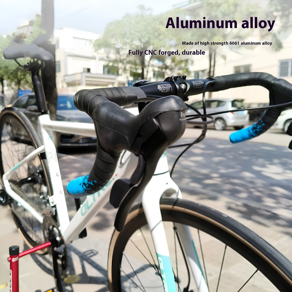 UNO aluminium road bike drop handlebar in black, showing curved drop shape and printing mark.