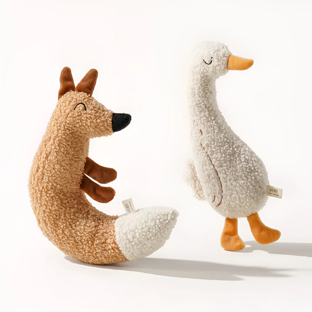 Cartoon fox and duckling pet chew toys with soft plush fabric and crinkly sound filling