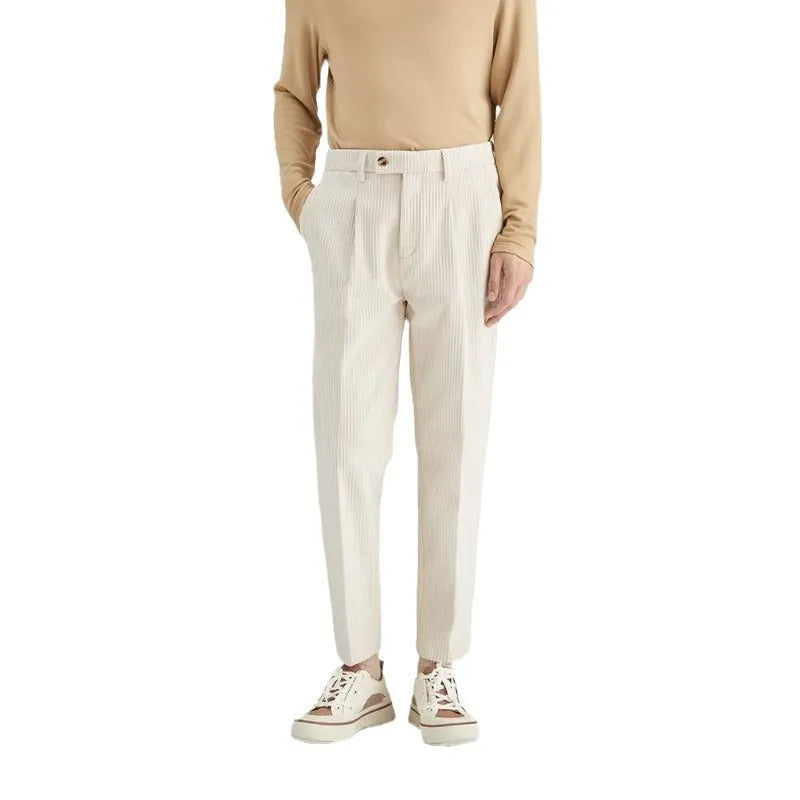 Men's straight-leg corduroy trousers in black, beige, and brown grey colours showing loose fit and textured fabric