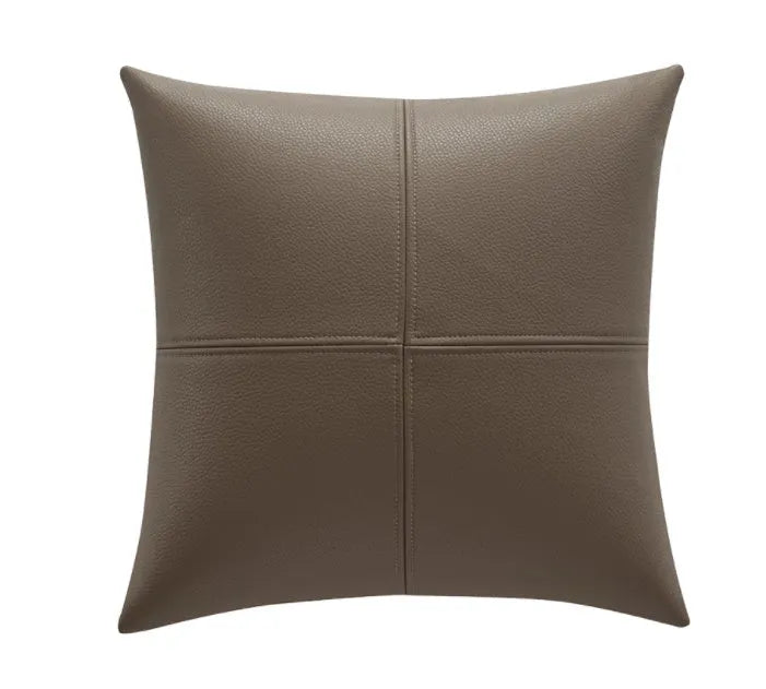 Soft cowhide leather solid colour pillow cover in a neutral shade on a sofa