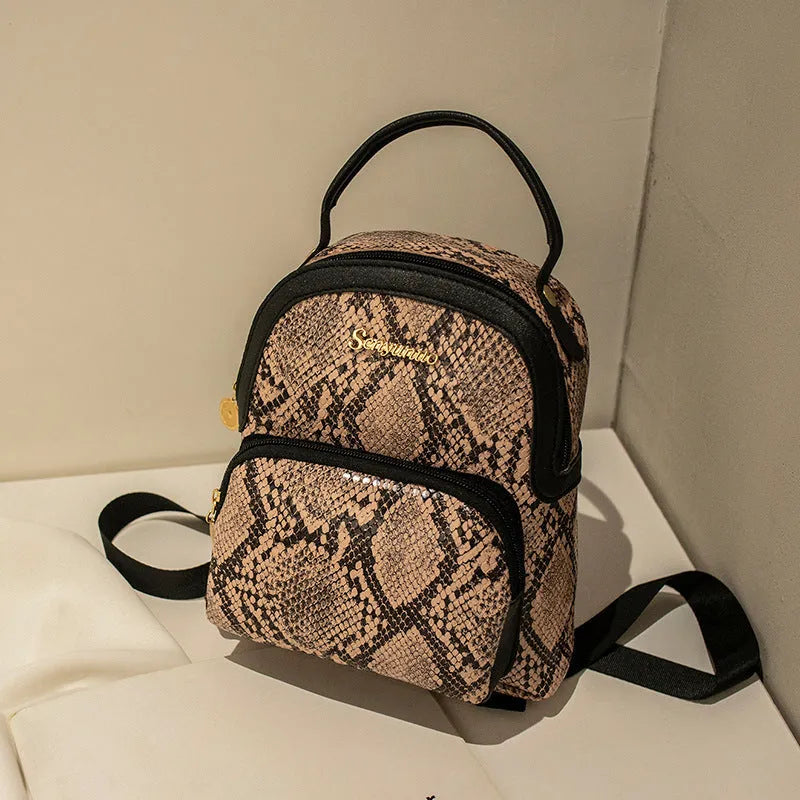 Girls' small PU backpack in Korean style with front pocket, in Snake White colour