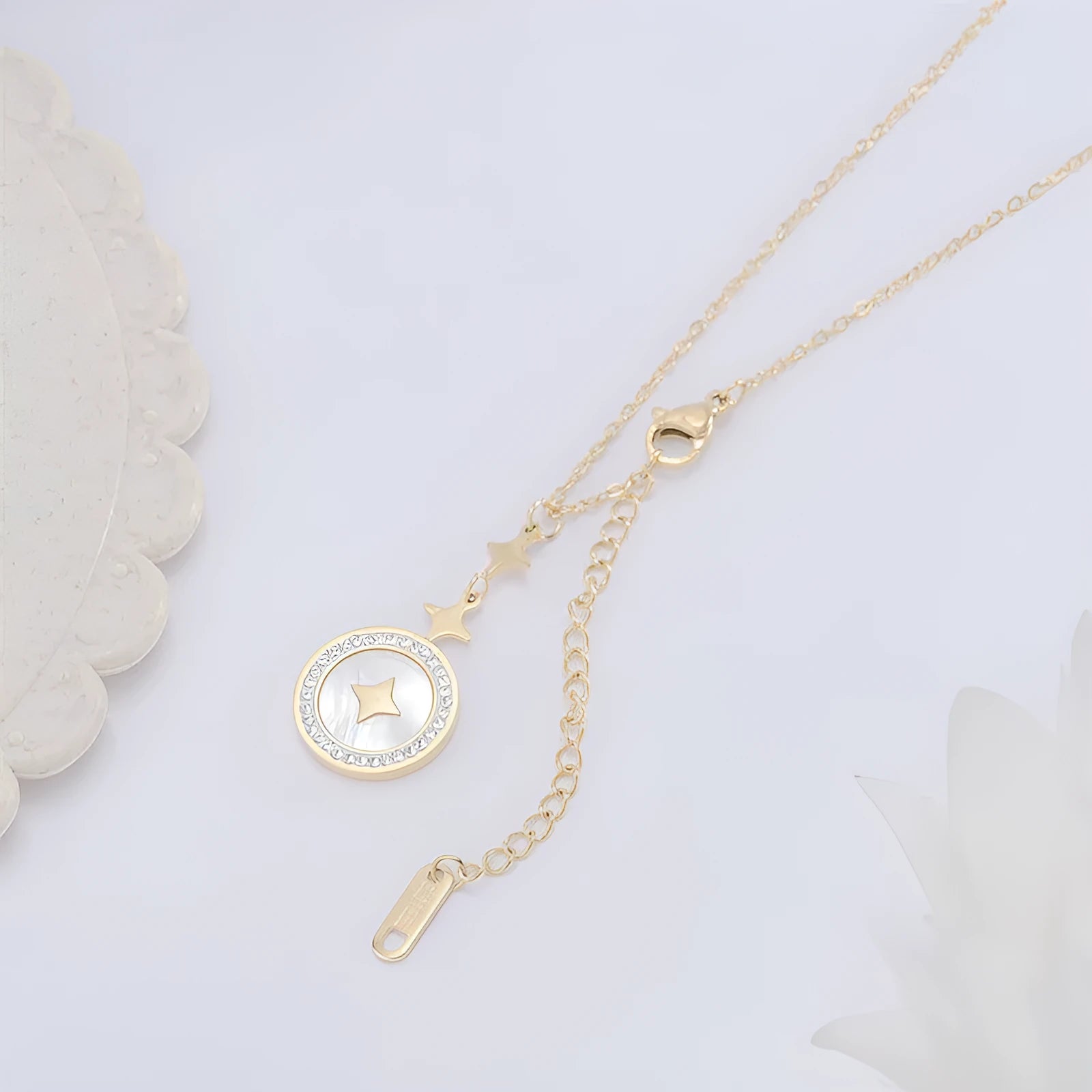 Gold titanium steel necklace with hexagonal star pendant on O-ring chain.