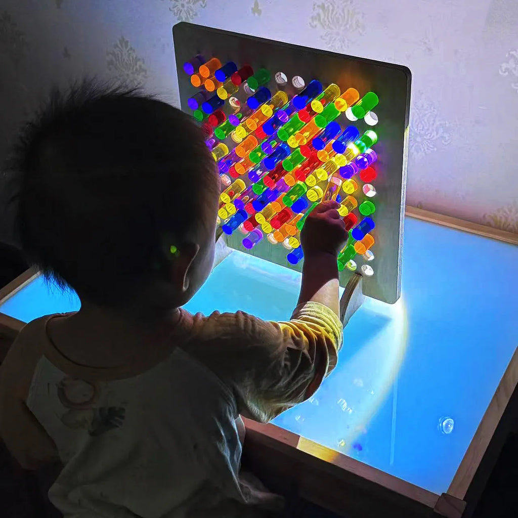 Montessori wooden wire-wrap board with 100 light guide rods in six colours for children aged 3-6
