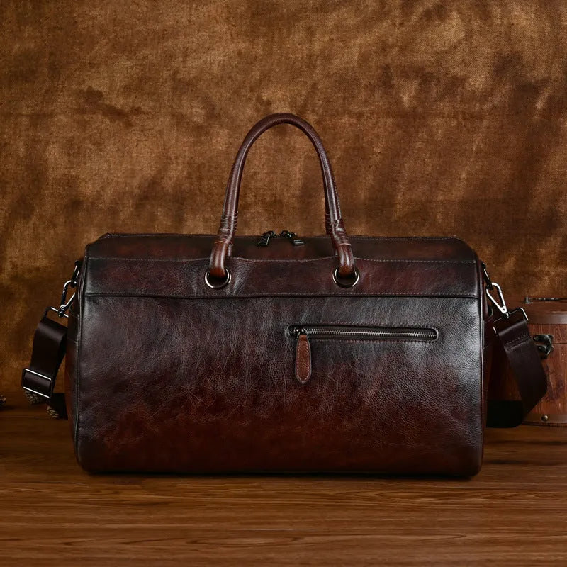 Brown genuine leather backpack with retro styling and 20L capacity