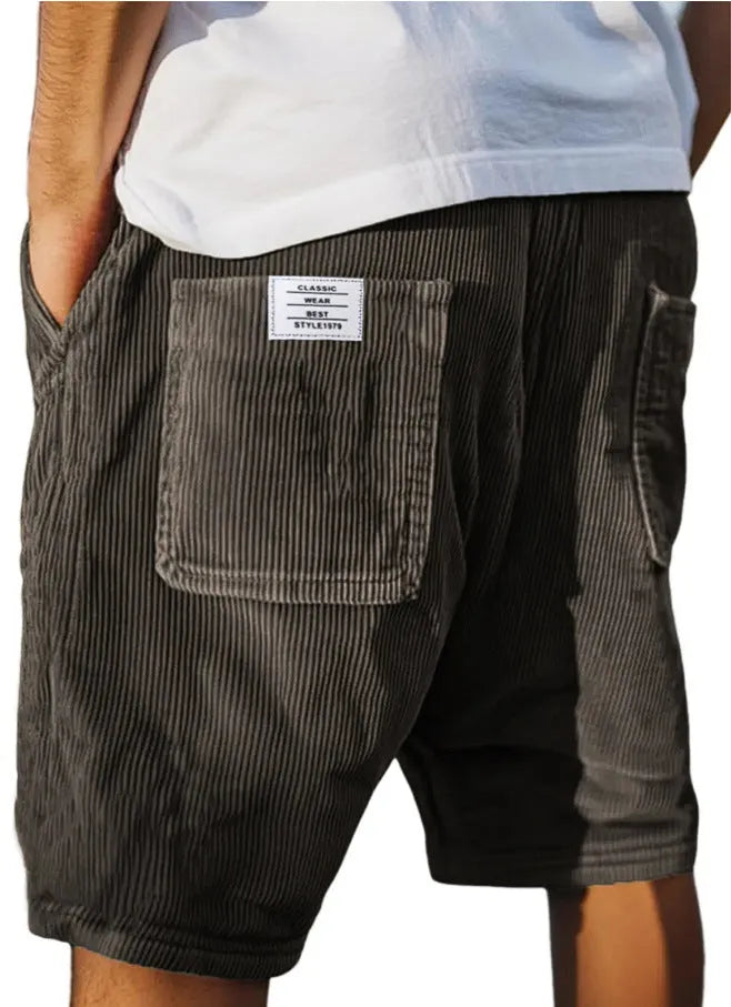 Men's gray corduroy shorts with multiple pockets and embroidered mark detail on straight-leg summer shorts