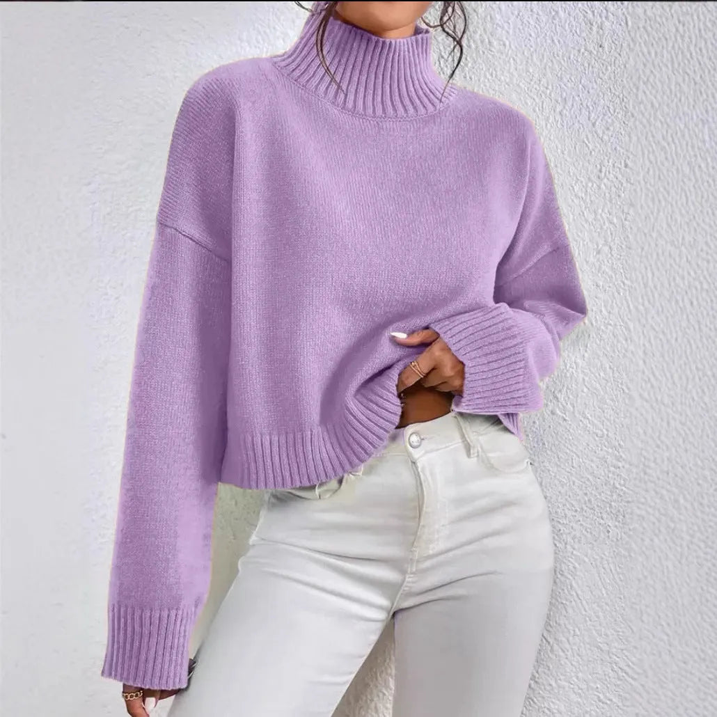Loose versatile basic women's pullover in gray, showing thread texture and relaxed fit