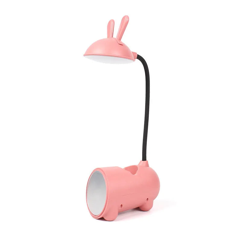 Cartoon-themed desktop table lamp with integrated pen container in green colour