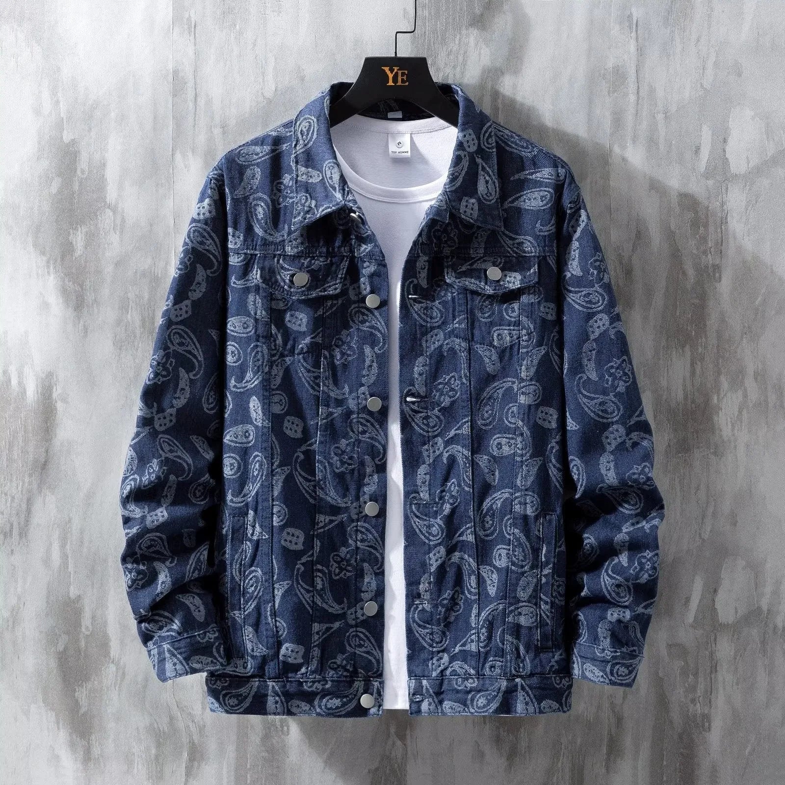 A slim fit men's denim coat in street fashion style, shown in a light blue colour with patch pockets.