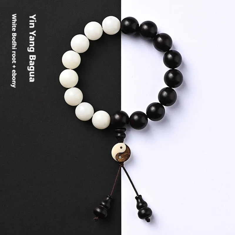 Handcrafted Bodhi bracelet with White Corypha and Blackwood eight-diagram beads