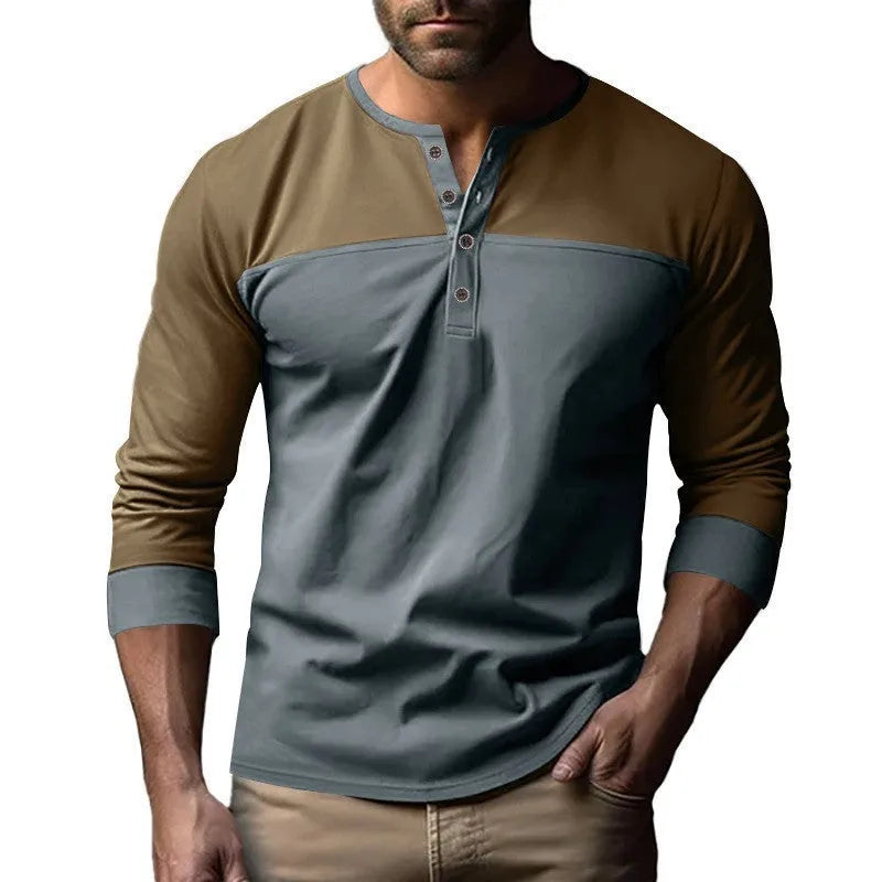 Man wearing a long-sleeve henley collar casual shirt in a solid colour with textured beaded twill fabric.