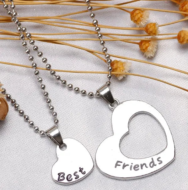 Two silver heart-shaped alloy puzzle necklaces on a cross chain, set of two, women's jewellery