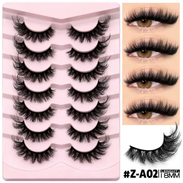 Box of natural false eyelashes with thick artificial fibre lashes and glue tube