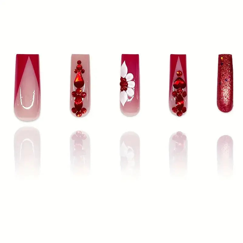 Press-on false nails with sweet flowers pattern and red diamond accents in European Square long style.