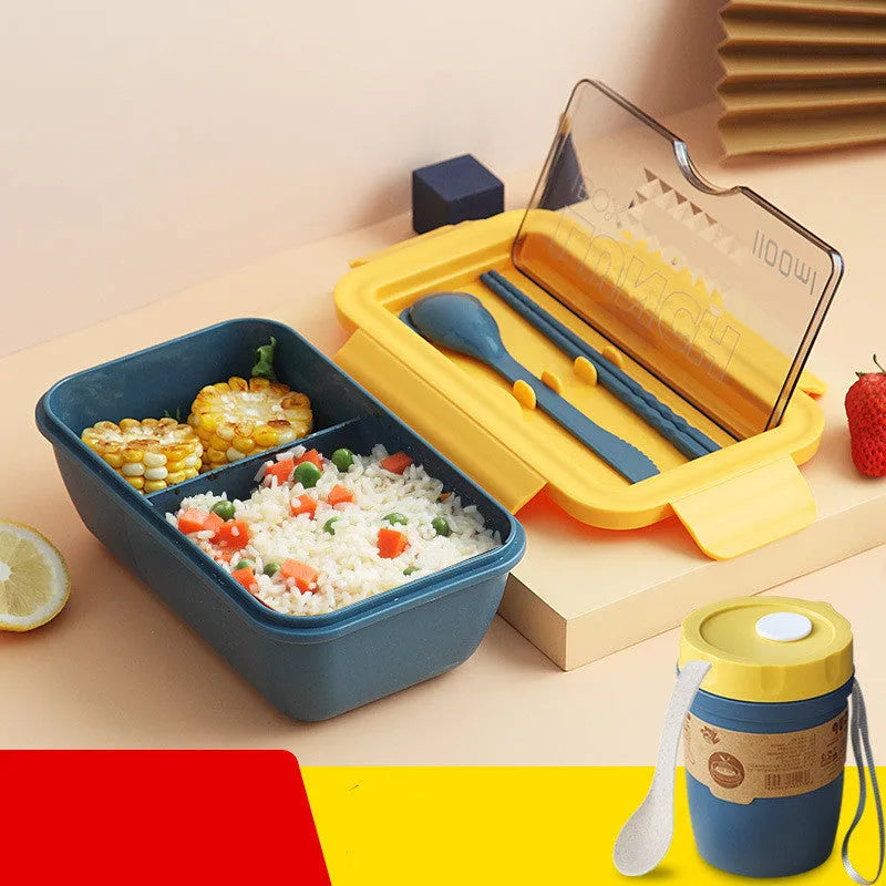 Green four-layer partitioned bento box with Nordic style design on a table.