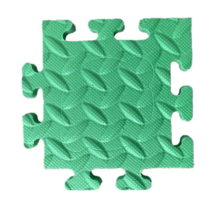 EVA foam pet ac button non-slip mat in green, square shape 16x16x1cm, on a wooden floor