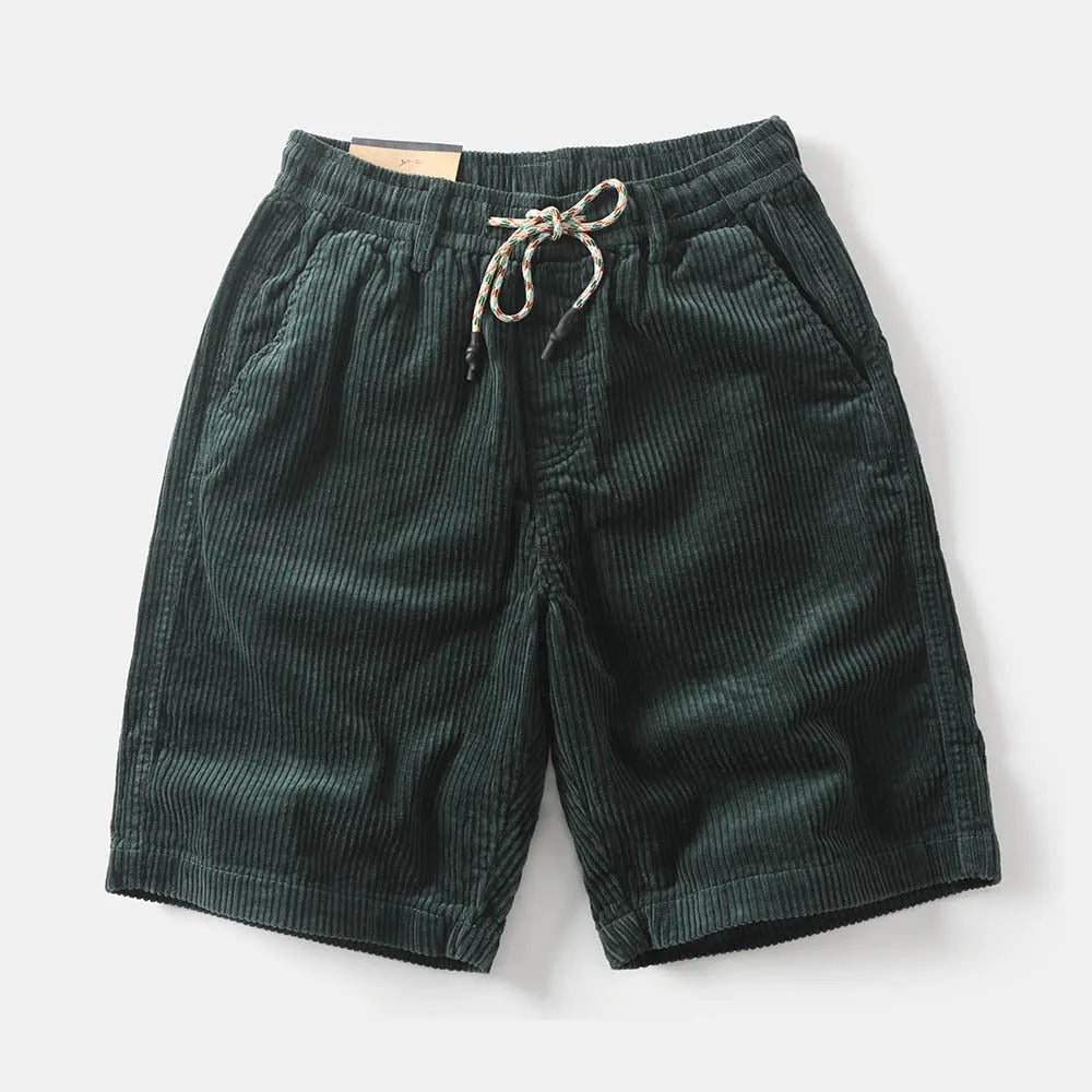 Man wearing retro khaki cargo shorts with a straight leg and street style design.