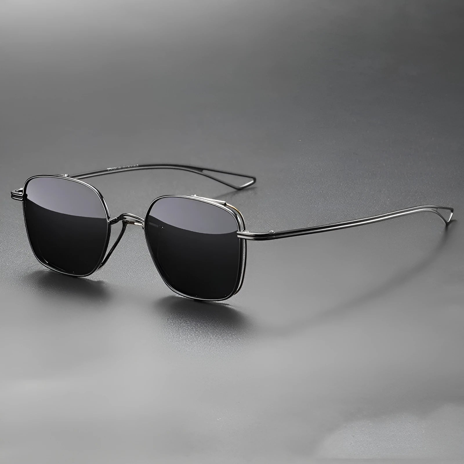Polarized sunglasses with pure titanium frame in box style, gun mount colour with black and gray lenses