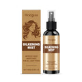 100ml bottle of hair care spray with ginger and rosemary extract formula