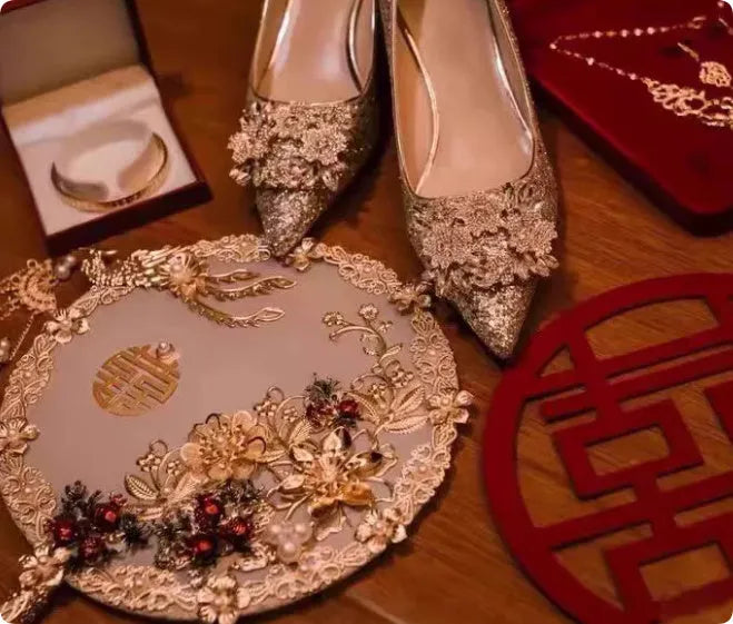 Champagne coloured pointed toe bridal shoes with rhinestone flower pattern and fine heel.