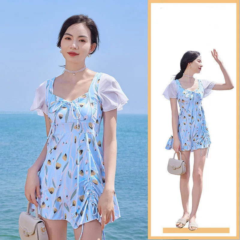 Women's floral one-piece swimsuit in Sea Salt Blue colour on a mannequin
