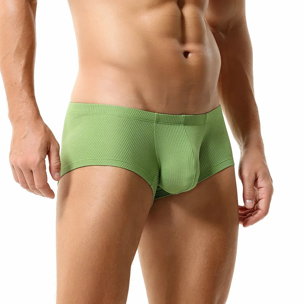 Men's solid colour boxer briefs with mid-low waist design in breathable nylon fabric