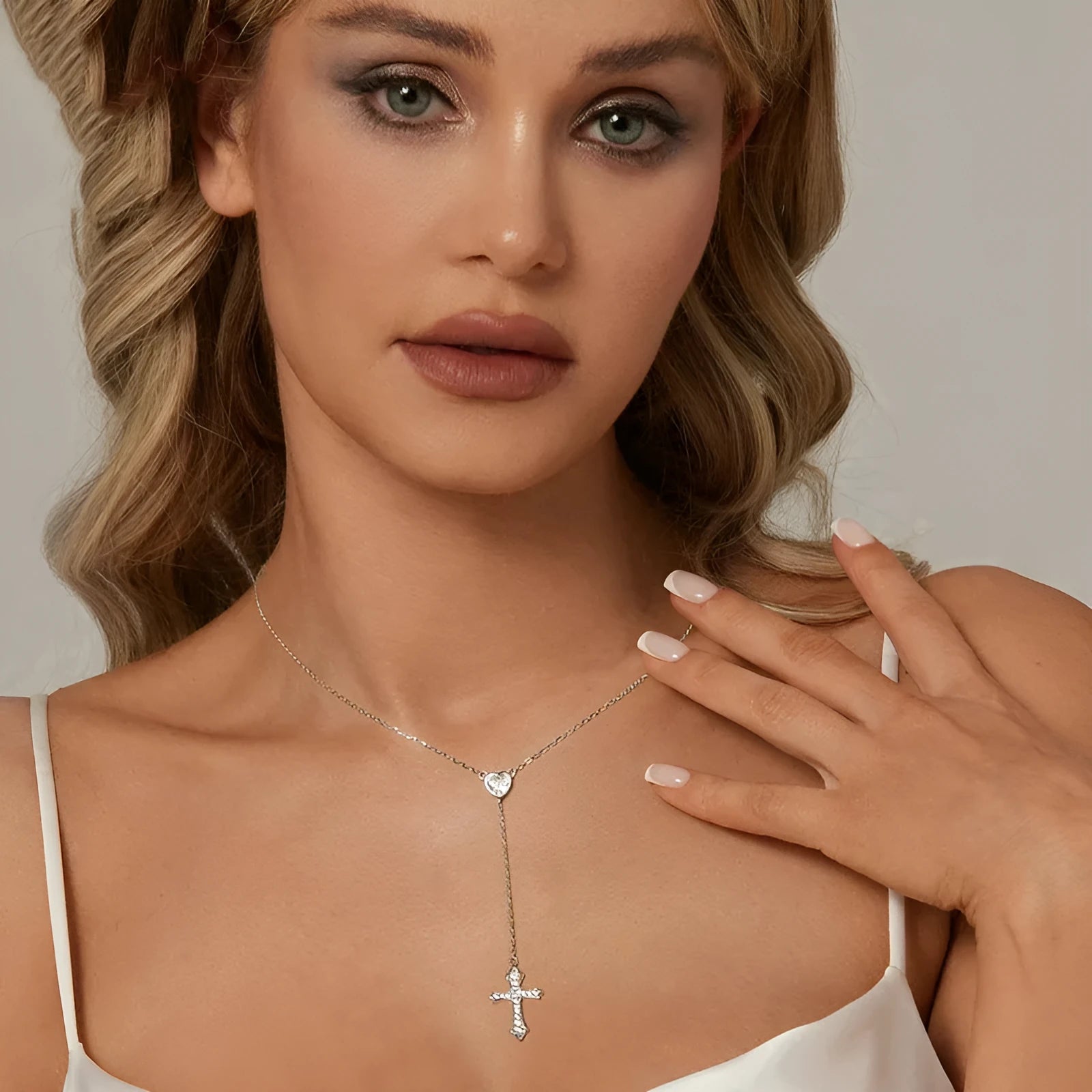 Women's sterling silver V-neck cross necklace on an O-ring chain in BSN384 colour.