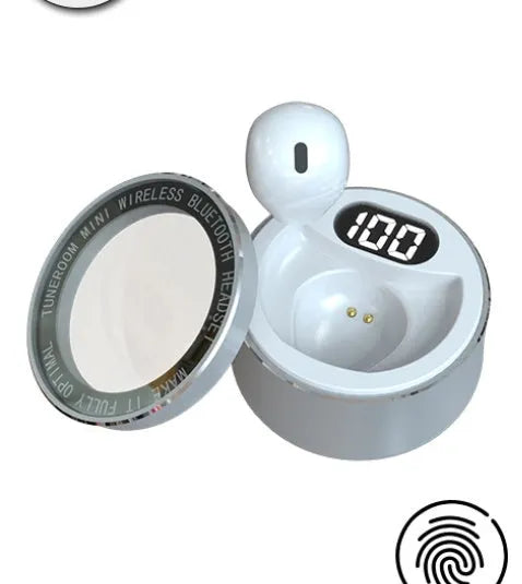 Miniature 9mm transparent Bluetooth earphone in skin tone, shown fitting discreetly in an ear.