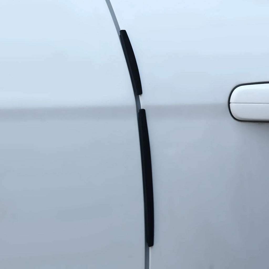 Solid white plastic car door edge protector strip showing its 0.5cm thickness and adhesive backing.