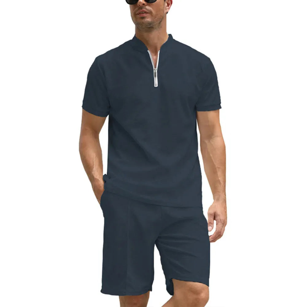Men's solid colour short sleeve polo shirt and matching trousers two-piece set.