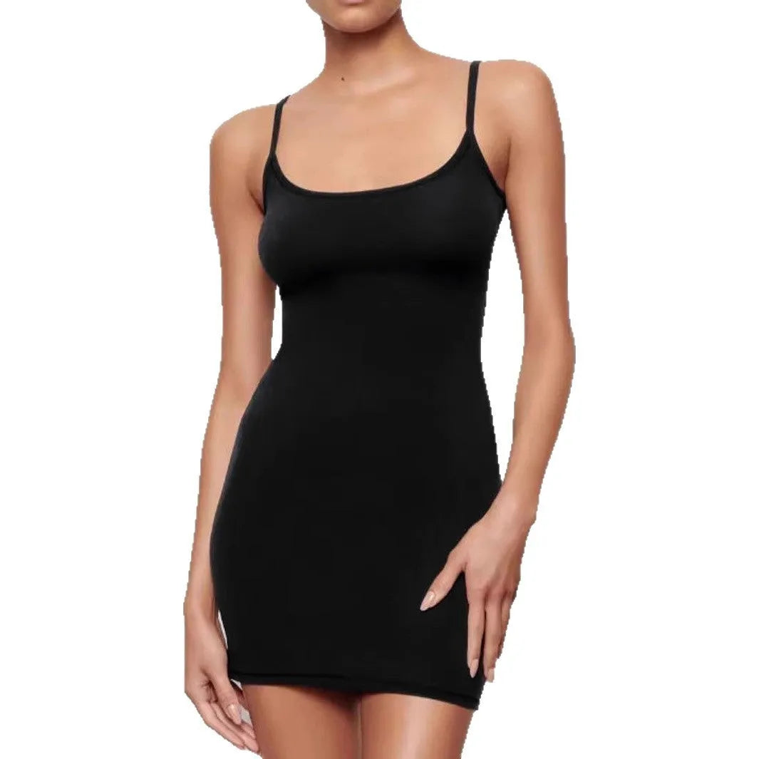 A black sleeveless sling dress with a sheath silhouette and short skirt.