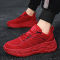 Cushioned rebound long-distance running shoes with breathable mesh upper, rubber and EVA sole, front lacing, in white, black, red, or yellow.