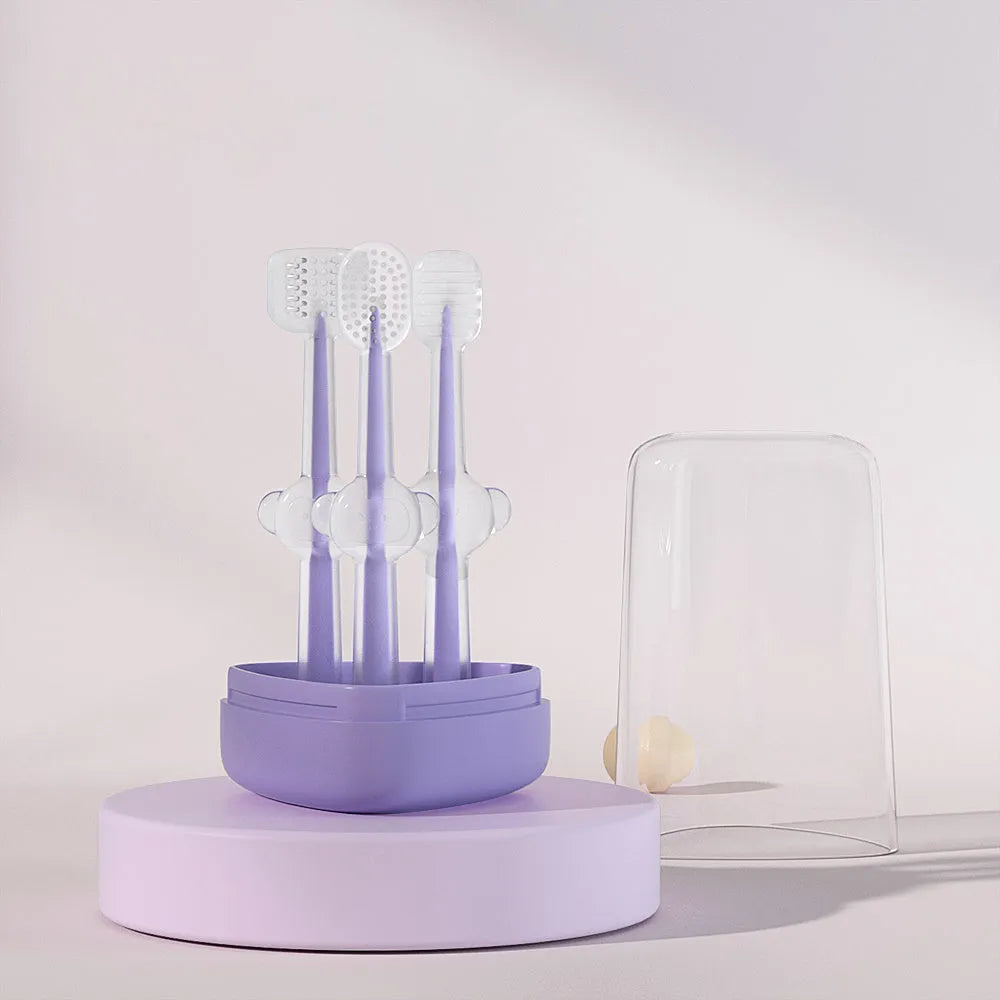 Soft silicone pet toothbrush for dogs and cats in purple, blue, and green colours with curved handle